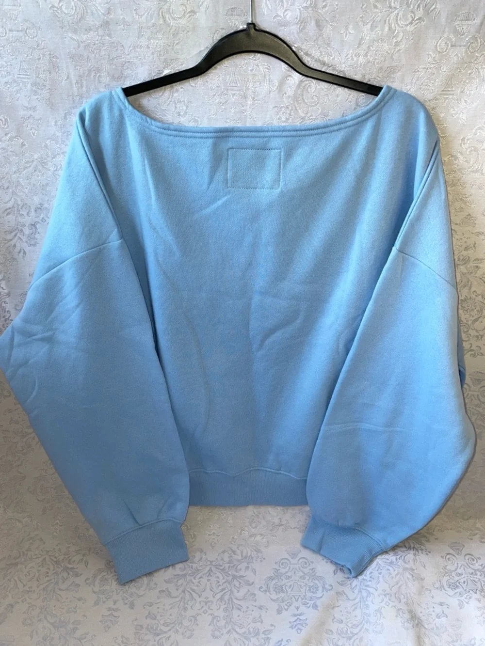 NWT Peanuts Light Blue Off-Shoulder Sweatshirt with Pink Bow Snoopy. See XXL. - Picture 2 of 5
